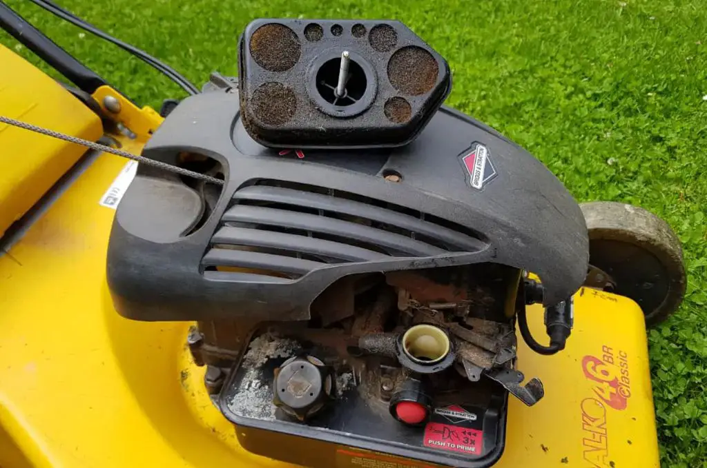 How do I clean the air filter on my lawn mower