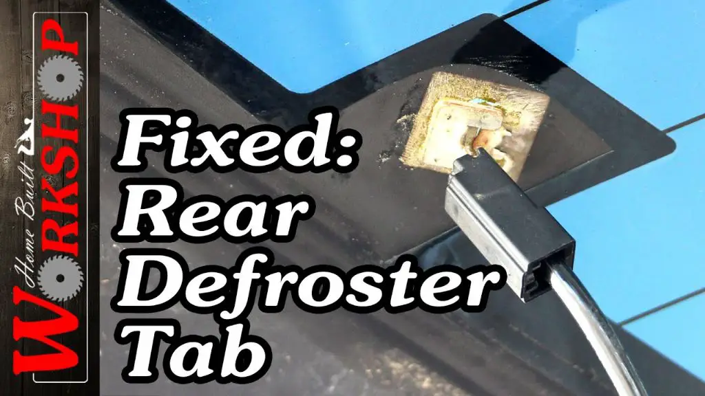 How do you reattach a rear window defroster tab