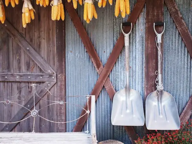 What is the best way to hang shovels and rakes in garage