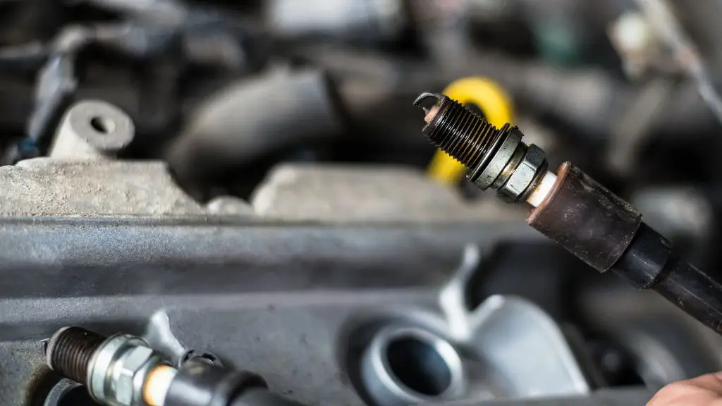 How do you get oil out of spark plug wells