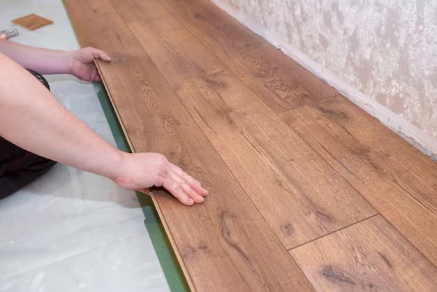 Is it better to recoat or refinish hardwood floors