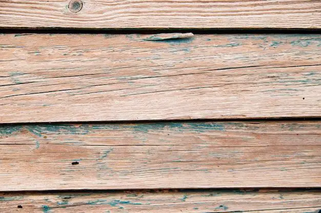 Can you paint over old wood siding