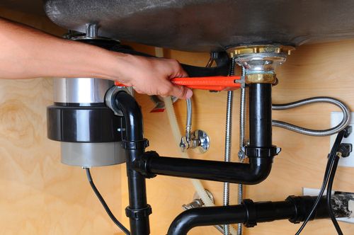 How do you replace a garbage disposal baffle