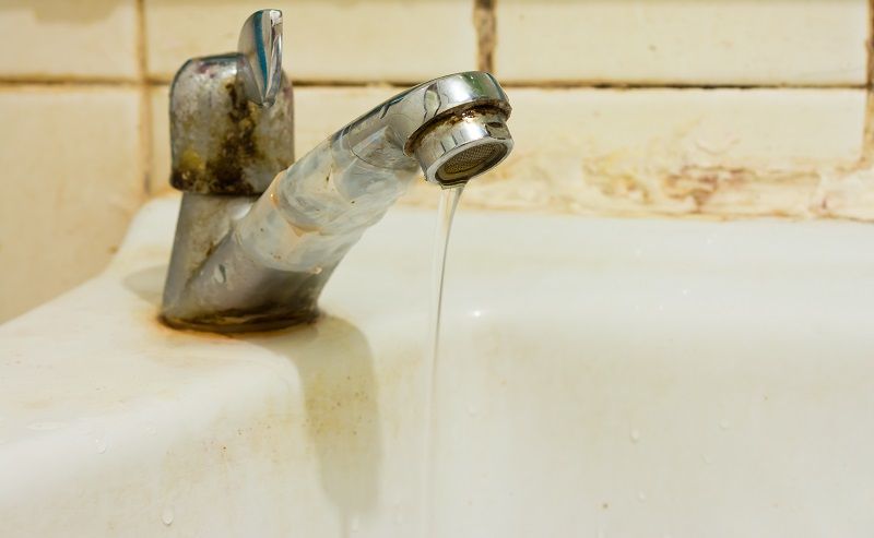 How do I get the mildew smell out of my bathroom sink