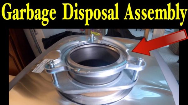 How do you replace a flange on a garbage disposal?