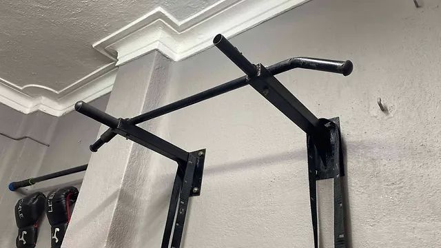 Is it safe to install pull-up bar on wall