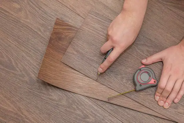 How do you fix seams in vinyl plank flooring