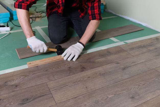 How do you fix vinyl flooring sheets