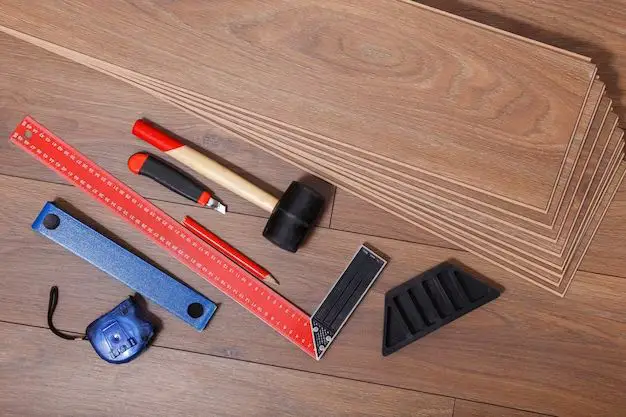 What tools are needed to install laminate flooring