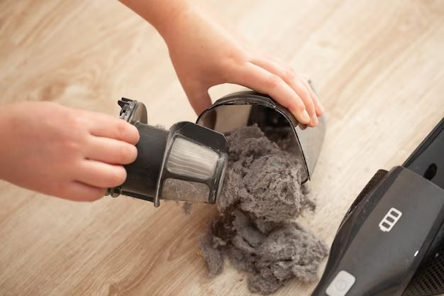 How do you get powder out of carpet without a vacuum