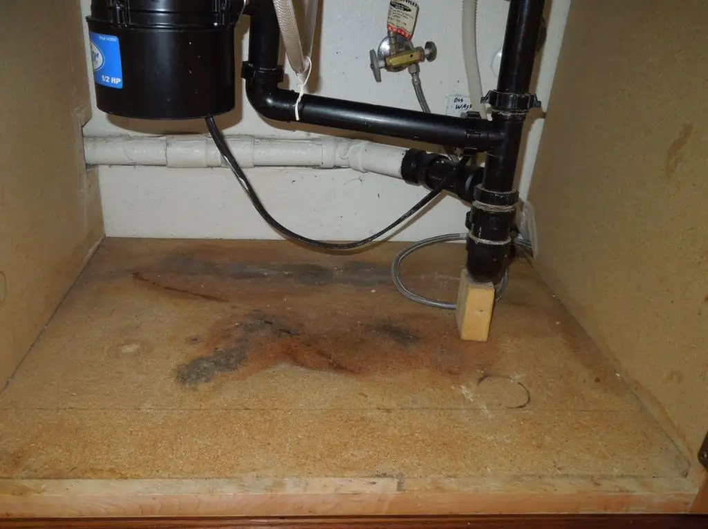 How do you replace a rotted board under a kitchen sink