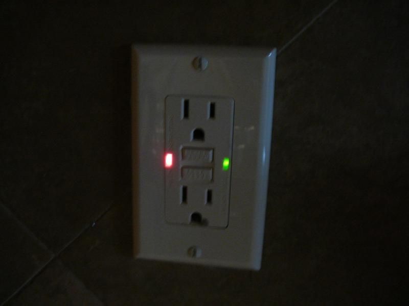 Why is the red light on my GFCI outlet but no power