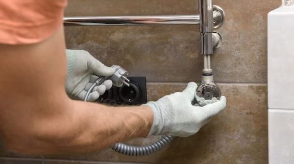 How do you replace a towel rail on tile?