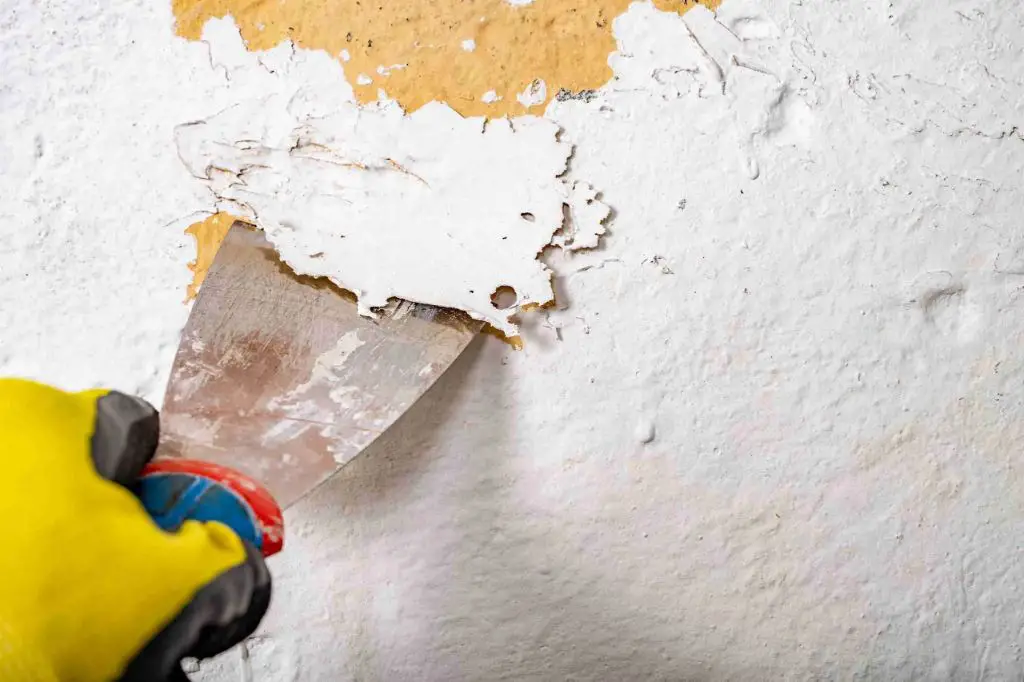 Will acetone remove paint from drywall