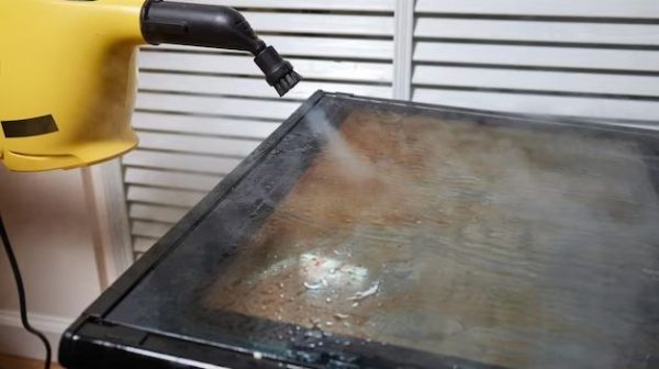 How do I use steam clean on my oven?