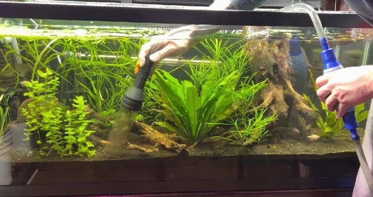 Is sand hard to clean in an aquarium