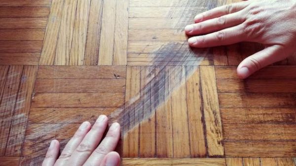 How do you repair scratches on luxury vinyl plank flooring?