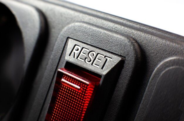 How do you reset an outlet with a reset button