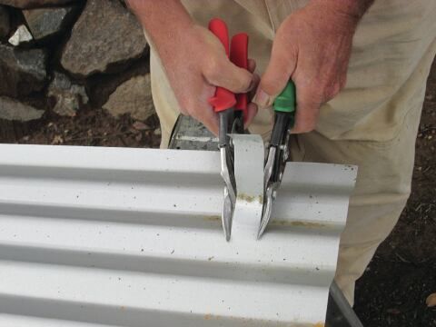 Can you cut metal roof panels with tin snips