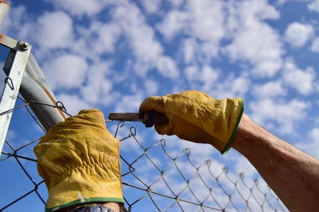 What tools do I need to repair a chain link fence