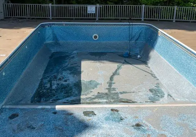 How do I completely empty my above ground pool