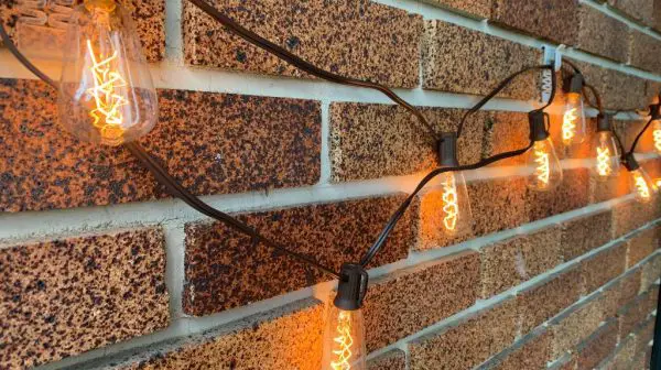 How do you hang Christmas lights on brick without glue?