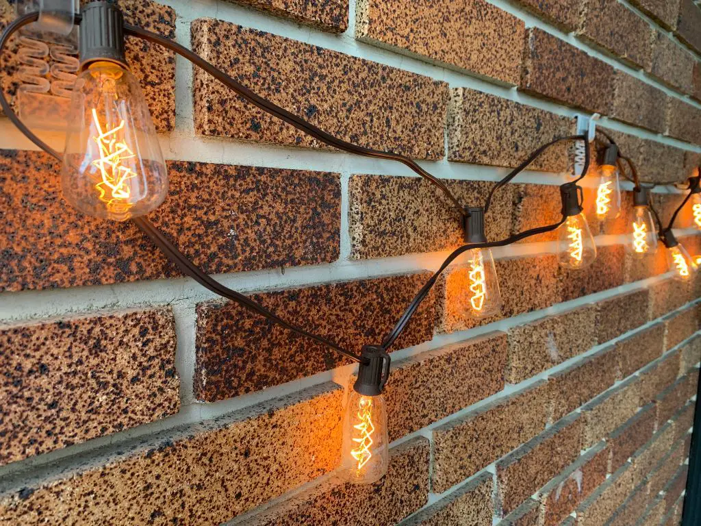 How do you hang Christmas lights on brick without glue