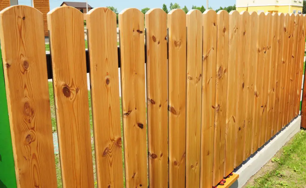 How can I extend the height of my existing fence