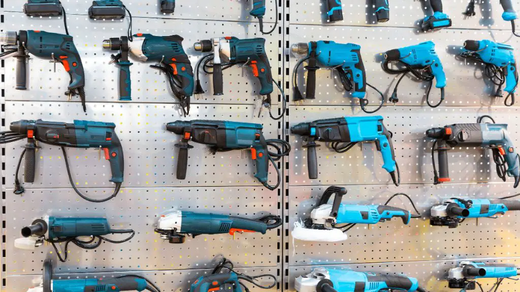 How should you store power tools when not in use