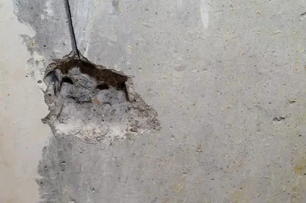 How do you fix a hole in a concrete floor