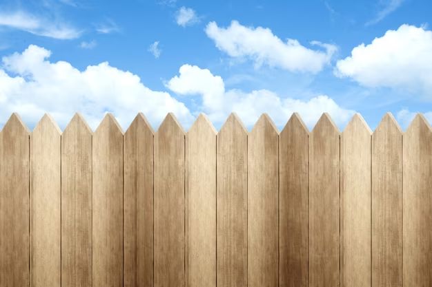 How do you make a wooden fence look pretty