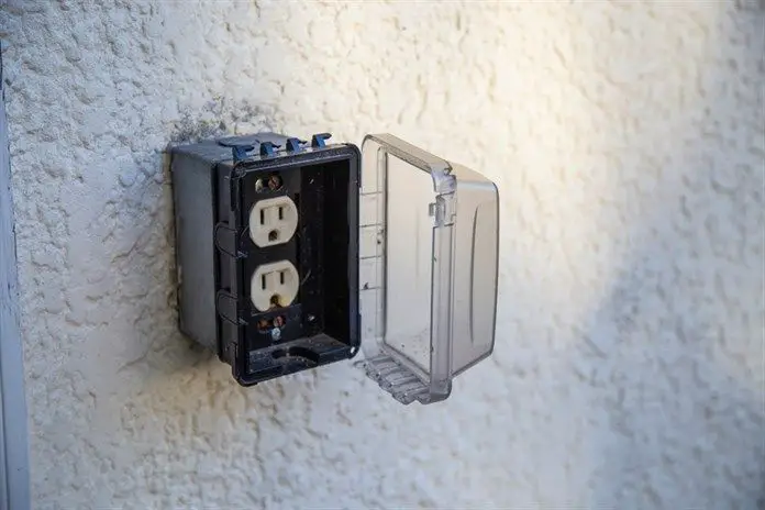 How do you waterproof an outdoor electrical outlet