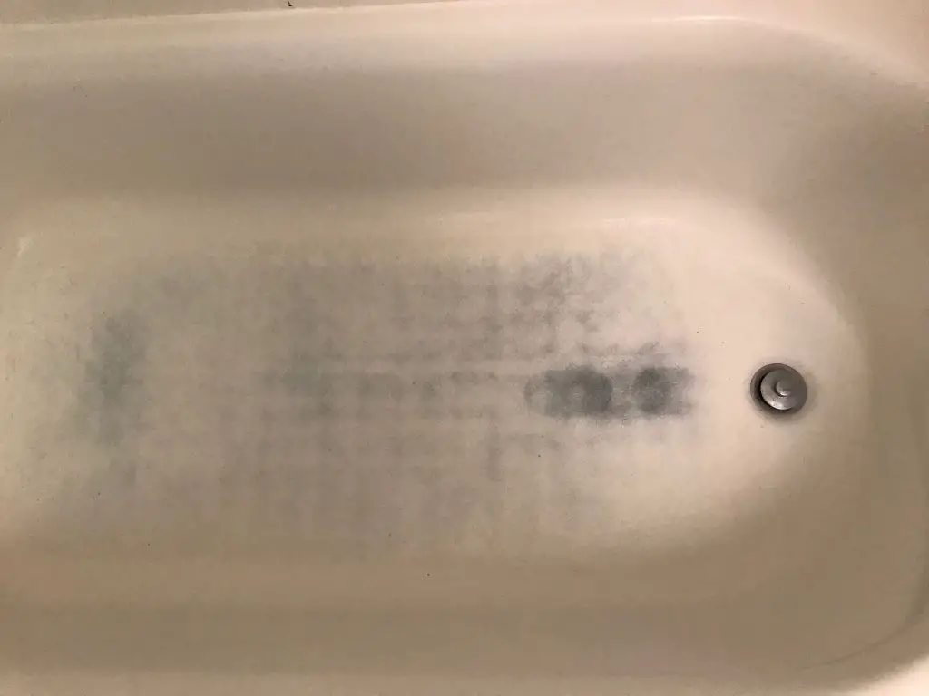 How do you get stains out of acrylic or fiberglass tub