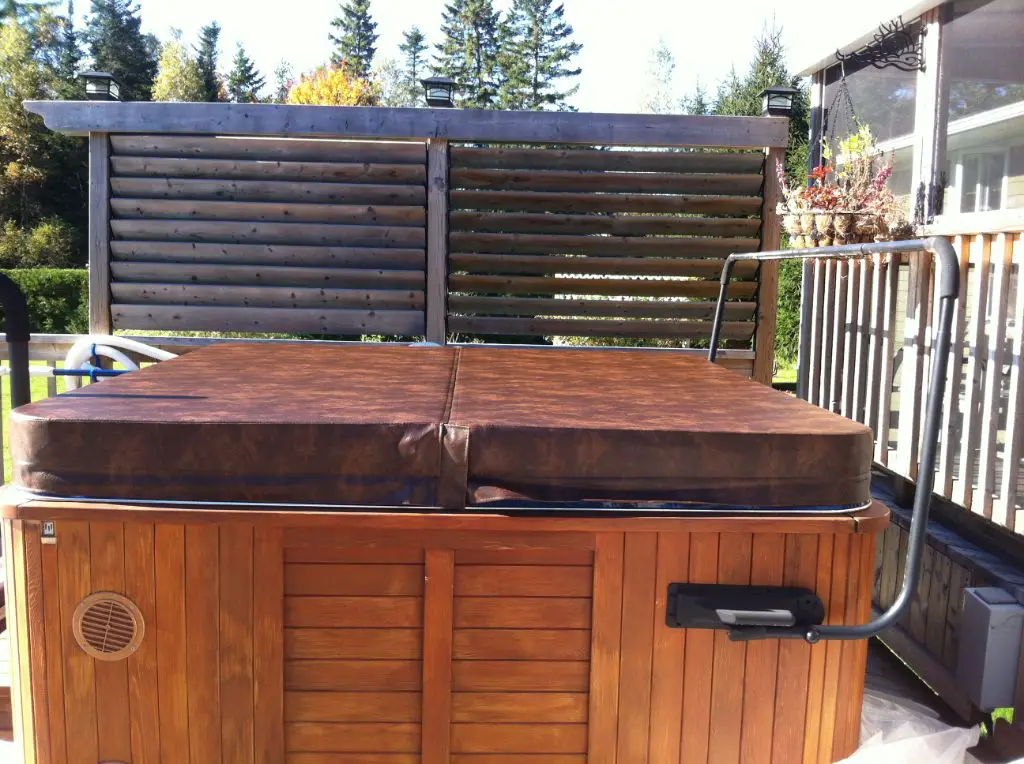 How do you block wind around a hot tub