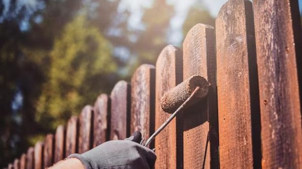 Can you use acrylic paint on wood fence?