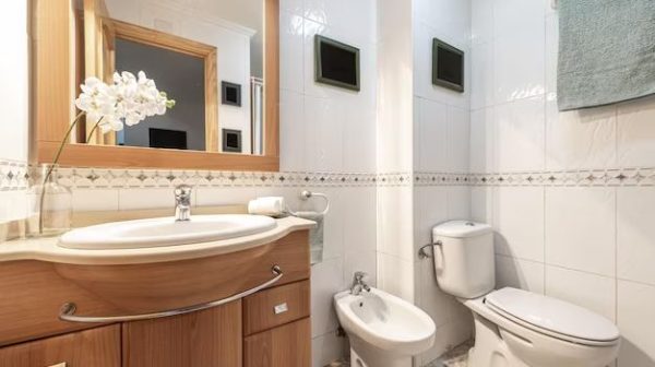 Is it OK to put towel bar over toilet?