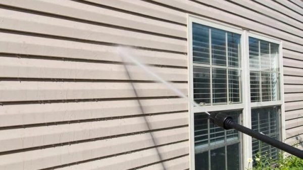 How do you clean vinyl siding without scrubbing?