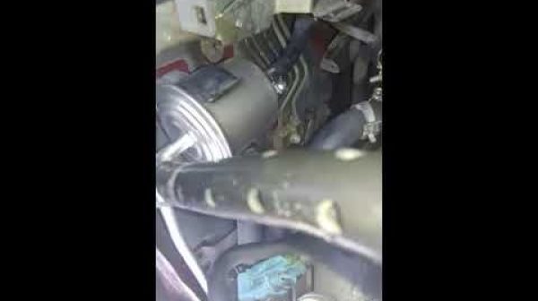 Where is Nissan Altima fuel filter located?