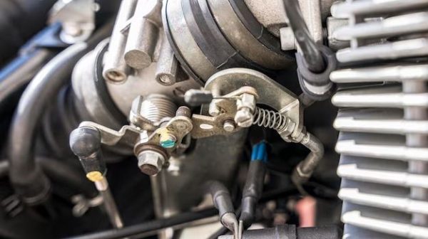 How do you fix a stuck throttle cable?