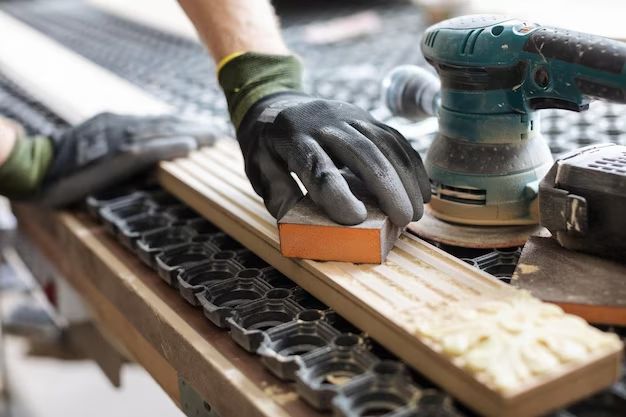 How do you use a hand sander manually