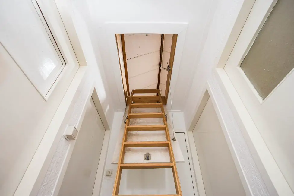 How do you seal an attic door in the ceiling