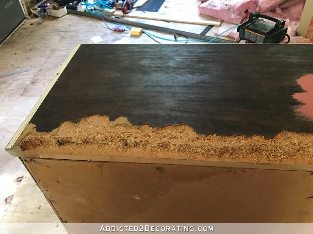 How do you fix water damaged particle board under a sink