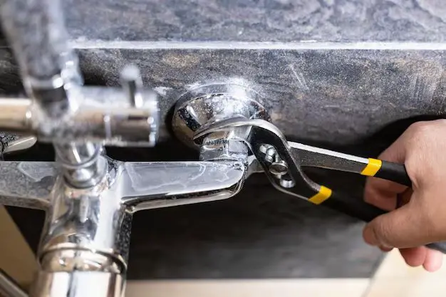 How do you unscrew a faucet nut