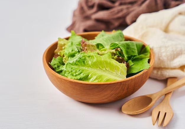 Do you wash wooden salad bowls