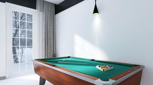 What is the minimum room size for a pool table?