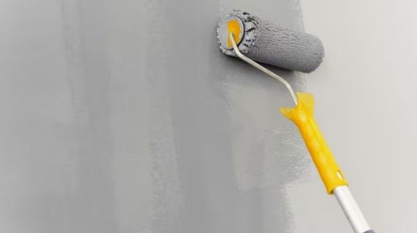 How do you blend paint when touching up a wall?