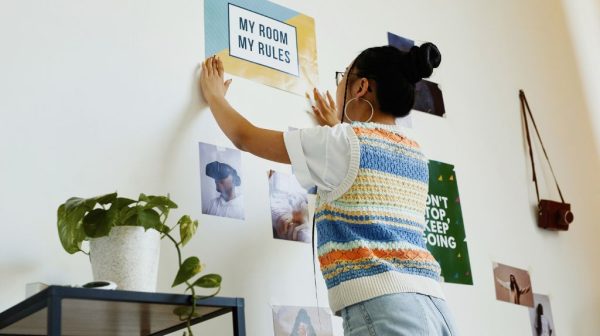 How do you stick posters to the wall without damaging them?