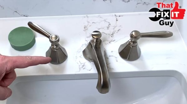 How do you tighten a loose bathroom handle?