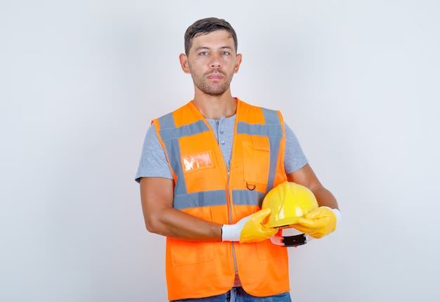 How should a construction worker dress