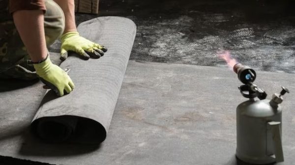 How do you waterproof a concrete floor?